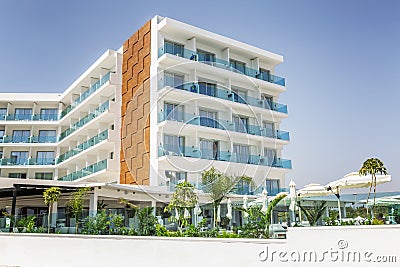 Protaras, Cyprus 09/09/2018: Exterior of the Hotel in the resort with a swimming pool and sun loungers Editorial Stock Photo