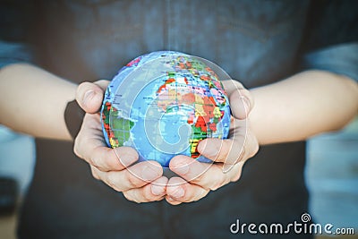 Protect our world in human hands Stock Photo