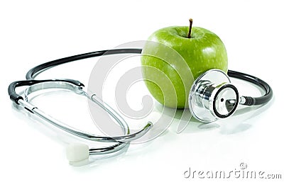 Protect your health with healthy nutrition.Stethoscope, apple Stock Photo