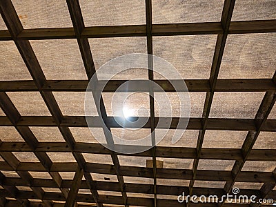 Protection against sunlight from the fabric and wooden frames to create a shadow outside. Stock Photo