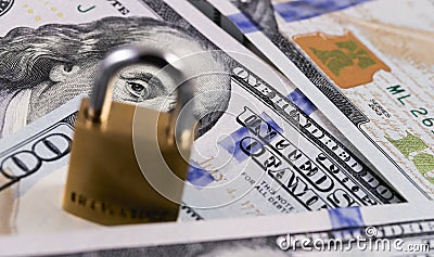 Protection money, dollars and lock Stock Photo
