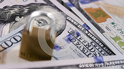 Protection money, dollars and lock Stock Photo