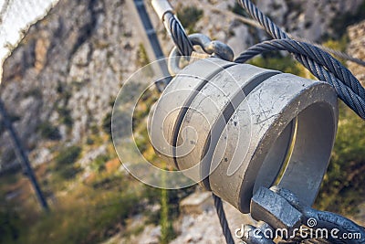 Protection wire mesh against falling rocks from the mountains. Editorial Stock Photo