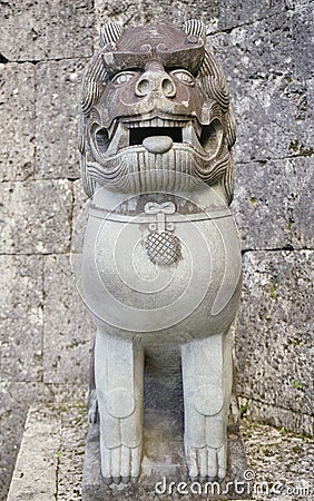 Protective deity Shisa lion sculpture on the front of the Kankaimon gate of Shuri Castle in the Shuri neighborhood of Naha, the Stock Photo