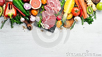 Protein menu: veal meat, vegetables and fruits. Stock Photo