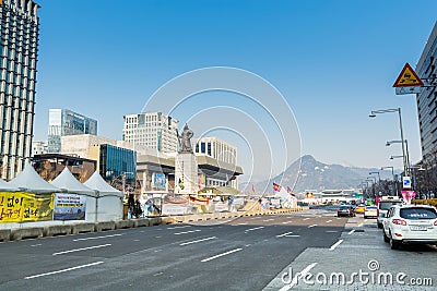 Protest camp and Statue of Yi Sunsin, a famous naval commander, famed for his victories against the Japanese navy during the Imjin Editorial Stock Photo