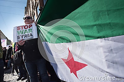 Protest signs against the war in Syria at demonstration Editorial Stock Photo