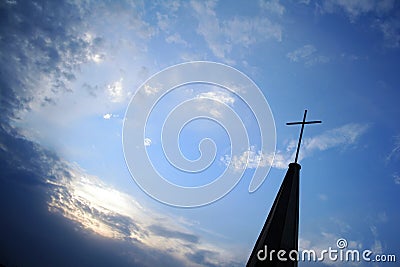 Protestant church top cross in the sky Stock Photo