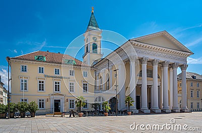 Protestant city church, tower with peace angel, Weinbrenner house and market square in Karlsruhe. Baden-Wuerttemberg, Germany, Editorial Stock Photo