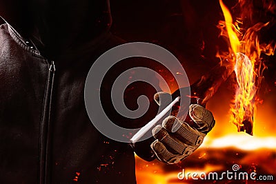 Protestant holding burning molotov cocktail Stock Photo