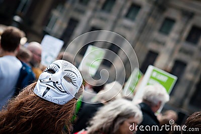 A protester wearing a mask Editorial Stock Photo