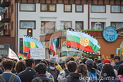 Protesters with Chilean and Mapuche flag at Puerto Montt city Editorial Stock Photo