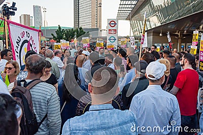 Protesters holding placards & posters at the March Against Racism demonstration of the dramatic rise of acid race related attacks Editorial Stock Photo