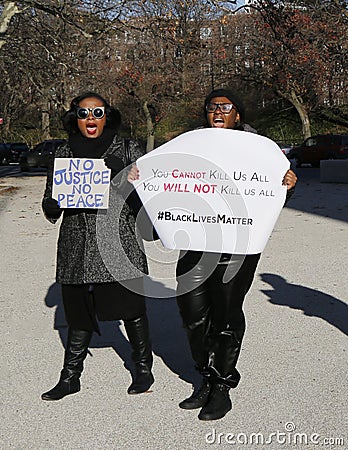 Protesters march against police brutality and grand jury decision on Eric Garner case on Grand Army Plaza in Brooklyn Editorial Stock Photo