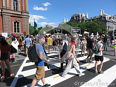 Protesters Marching Downtown Editorial Stock Photo