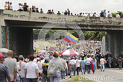 Protesters participating in the event called The mother of all protests in Venezuela against Nicolas Maduro government 2017 Editorial Stock Photo