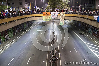 Protesters on Paulista Avenue during a protest against the increase in the value of bus, train and subway tickets Editorial Stock Photo