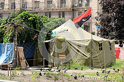 Protesters tents at Khreshatyk street with Ukrainian Insurgent Army flag Editorial Stock Photo