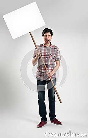 Protesting man with placard Stock Photo