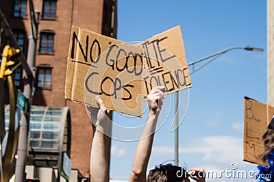 Protestor Holds Up Sign that Reads `No Good Cops` at Protest for George Floyd Editorial Stock Photo