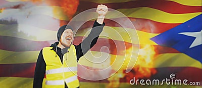 Protests yellow vests in Catalonia. Man raised his hand into a fist and shouted separatism concept Stock Photo