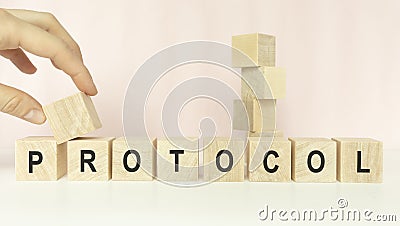 Protocol Word In Wooden Cube on a light Stock Photo