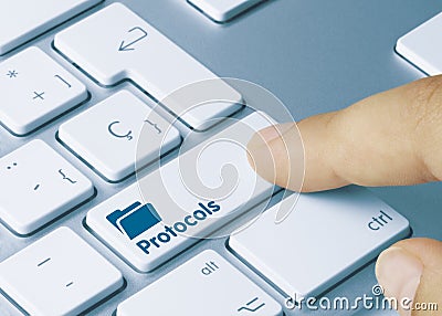 Protocols - Inscription on Blue Keyboard Key Stock Photo