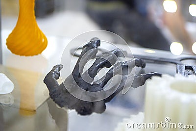 Prototype model part human skeleton wrist hand printed 3D printer molten plastic Stock Photo