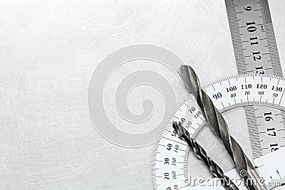 Protractor with drill bits Stock Photo