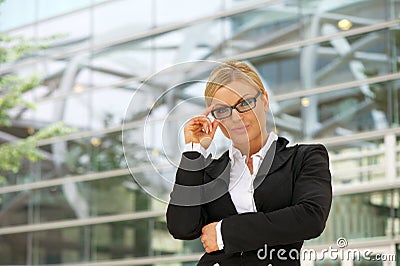 Proud business woman in glasses Stock Photo