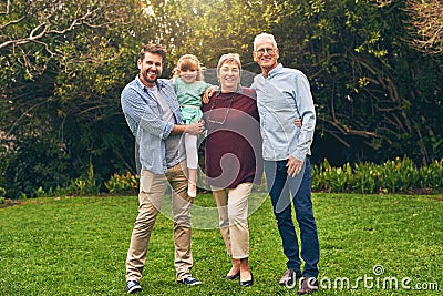 Proud of the family we created. Shot of a multigenerational family outside. Stock Photo