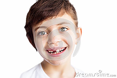 Proud happy smiling young girl age 7 with changing milk teeth, looking at camera. Childhood, child, dental concept. Healthy Stock Photo