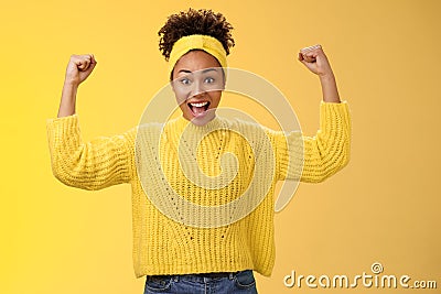 Proud impressed charming girlfriend encourage girlfriend win first place happy for friend rase fists celebration triumph Stock Photo