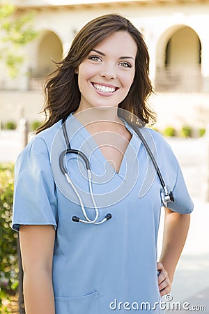 Proud Young Adult Female Doctor or Nurse Portrait Outside Stock Photo