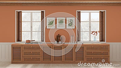 Provencal kitchen background with wooden and rattan cabinets in white and orange tones. Sink, and gas hob. Windows with shutters Stock Photo
