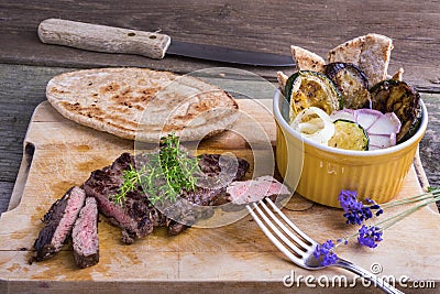 Provencal style horse meat entrecote steak with ratatouille and Stock Photo