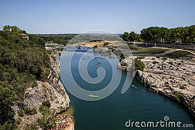 people swimming on boats on calm river in provence france Editorial Stock Photo