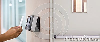 Proximity card door unlock, Hand security man using fingerprint scan on ID card reader access control system for identity Stock Photo