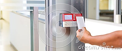 Proximity card reader door unlock, Hand security man using ID card on fingerprint scanning access control system for identity Stock Photo