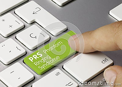 PRS Phantom Ringing Syndrome - Inscription on Green Keyboard Key Stock Photo