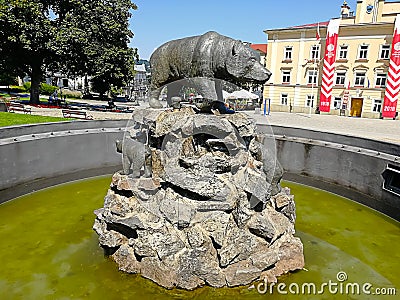 Przemysl, Poland - August 4, 2018: Fountain depicting a striding brown bear Editorial Stock Photo