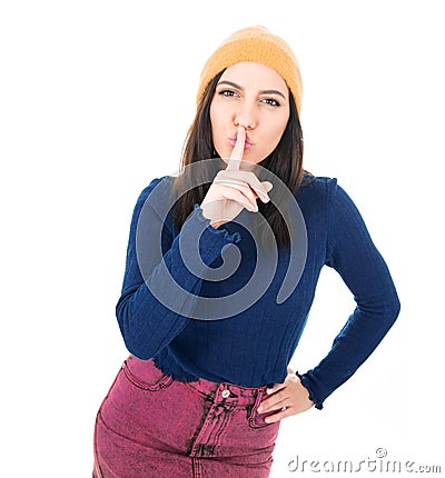 Psst. Young woman holding finger on lips, keep the secret concept, isolated on white background Stock Photo