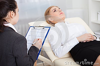 Psychiatrist examining patient Stock Photo