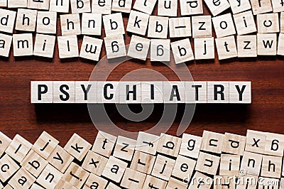 Psychiatry word concept on cubes Stock Photo