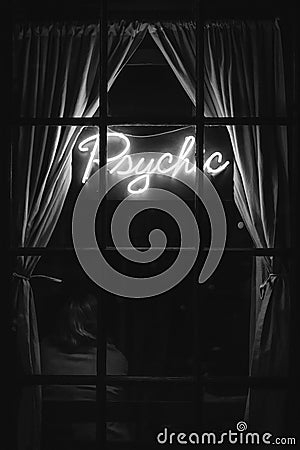 Psychic neon sign at night, in the West Village, Manhattan, New York City Editorial Stock Photo