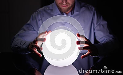 Psychic Predicting Future Using Crystal Ball Stock Photo