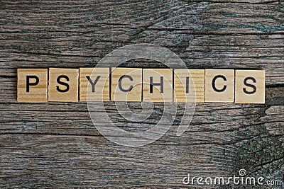 Psychics word made of wooden letters Stock Photo