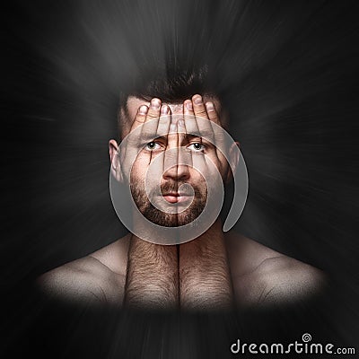 psychological portrait of a person, double exposure, face shines through hands, surreal portrait of a man covering his face and Stock Photo
