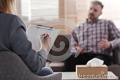 Psychotherapist analyzing patient`s problem Stock Photo