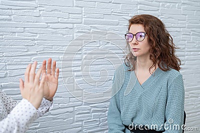 The psychotherapist conducts a hypnosis session. Female patient under hypnosis. Stock Photo